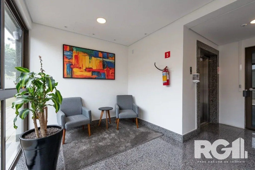 Imagem Apartamento de 3 dormitórios com suíte e churrasqueira, lavabo e 2 vagas de garagem.