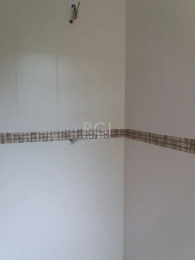 Imagem Apartamento de três dormitórios no bairro Independência em Porto Alegre.