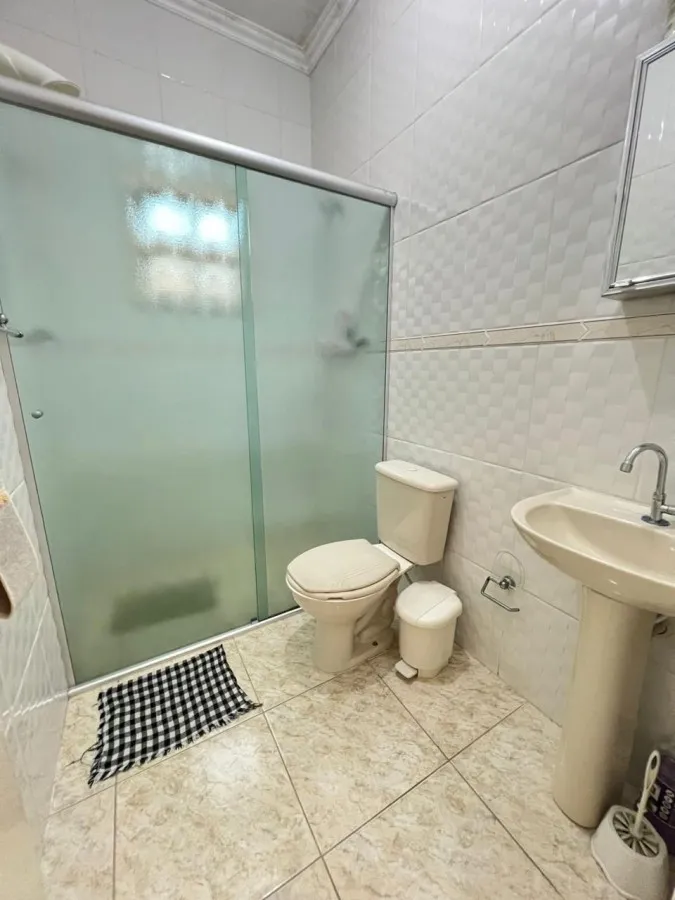 Imagem Casa para Venda em Praia Grande, Caiçara, 2 dormitórios, 1 suíte, 1 banheiro, 2 vagas