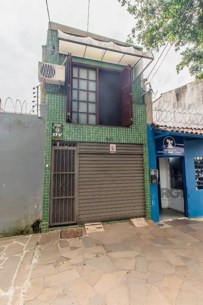 Imagem Casa para Venda - 110m², 2 dormitórios, sendo 1 suítes, 2 vagas - Menino Deus