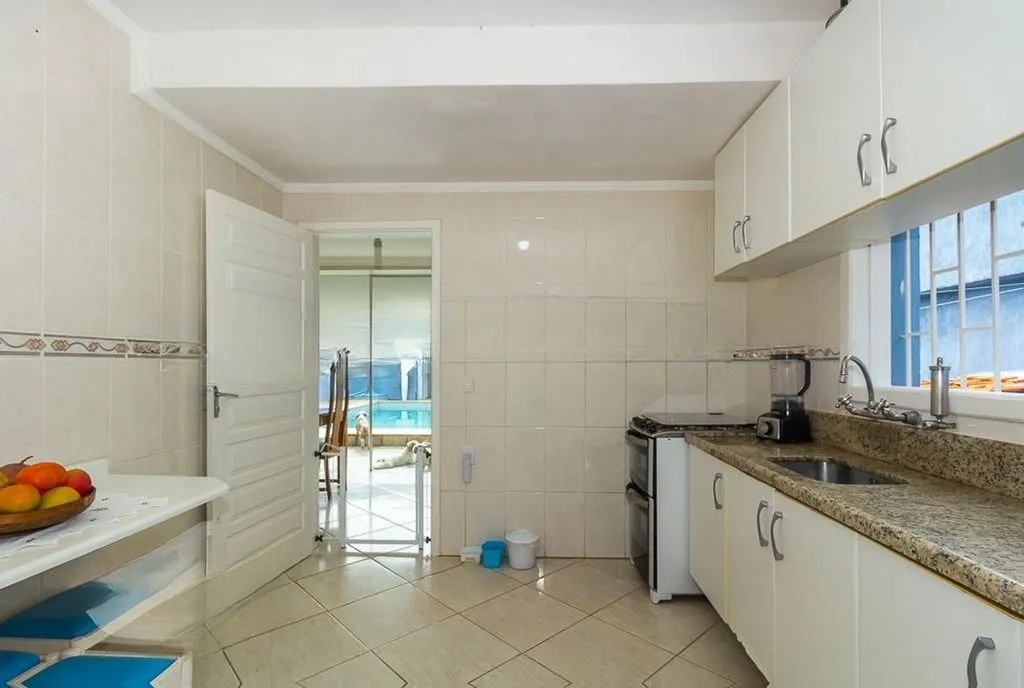 Imagem Casa de 4 dormitórios à venda no Bairro Ipanema - Porto Alegre