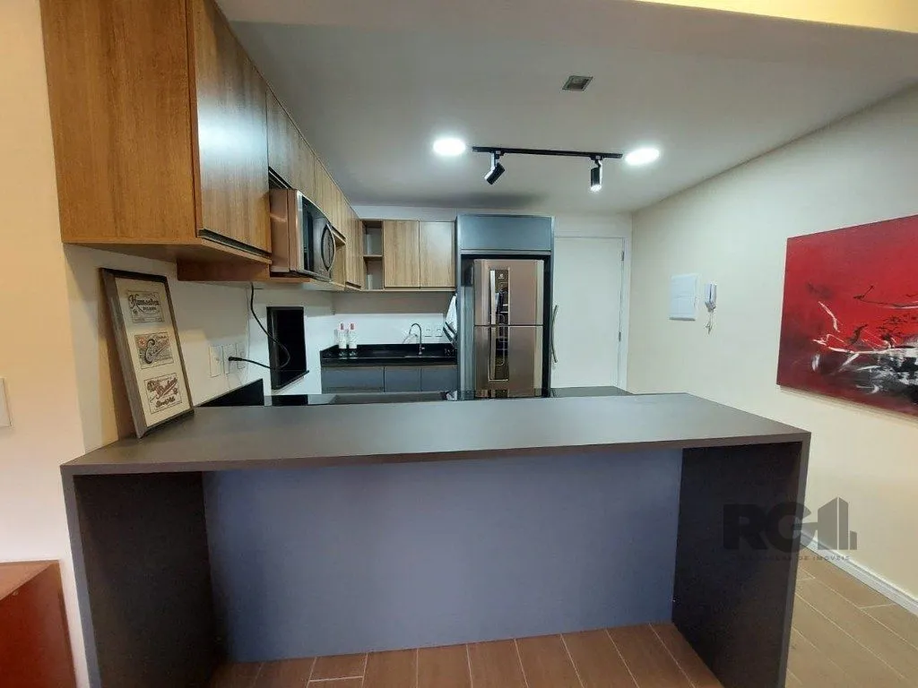 Imagem Apartamento stidio com 1 dormitório, 1 vaga de garagem no Bairro Auxiliadora.