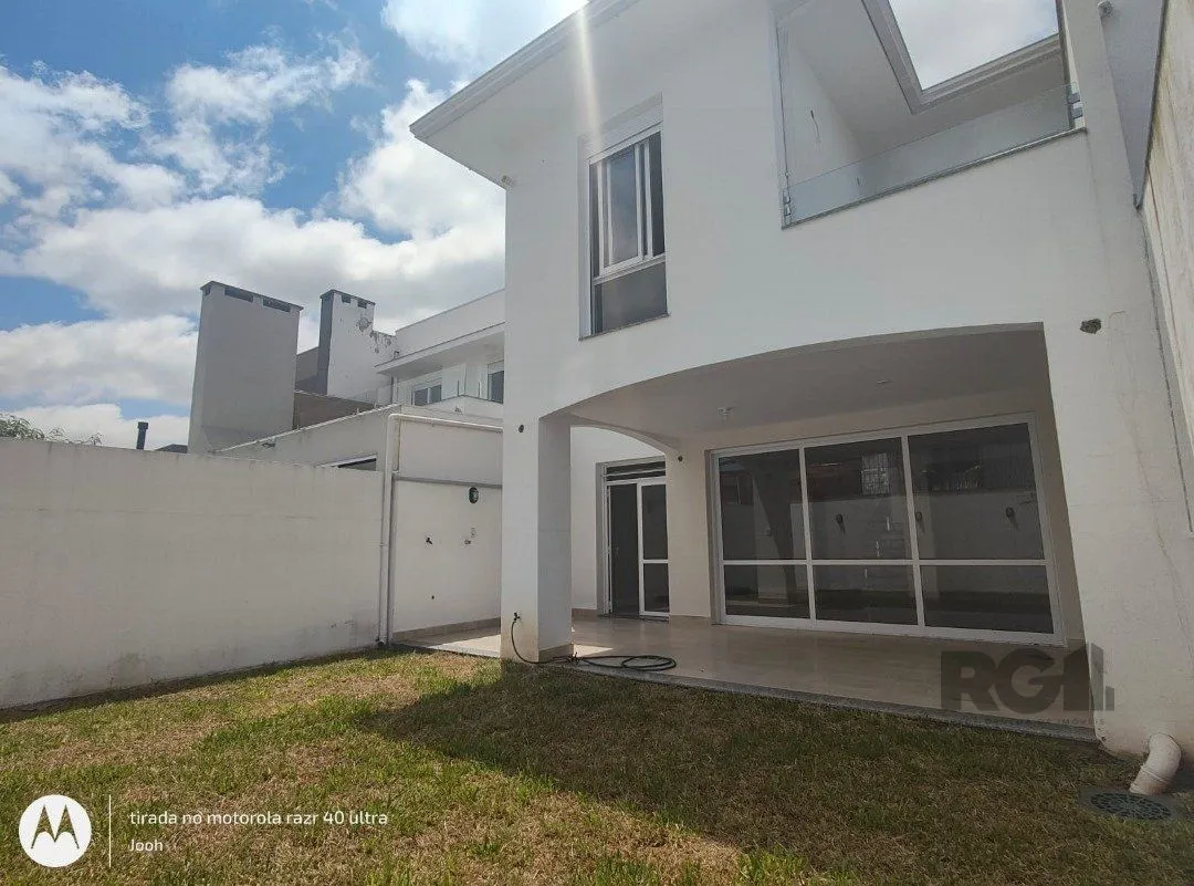 Imagem Casa em Condomínio fechado com 3 dormitórios no bairro Vila Nova em Porto Alegre, RS