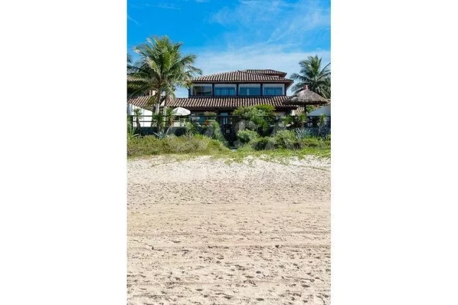 Imagem Imóvel de luxo em condomínio à beira-mar em Búzios-RJ: 5 quartos, 5 suítes, 8 banheiros, 3 vagas, 650m² de área. Venha conferir!
