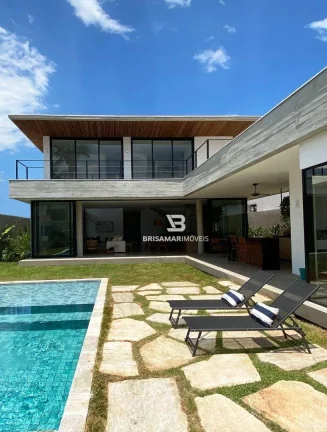 Imagem CASA DE ALTO PADRÃO EM CONDOMÍNIO PRIVILEGIADO NO GUARUJÁ – 5 SUÍTES, ÁREA GOURMET E BEACH HOUSE