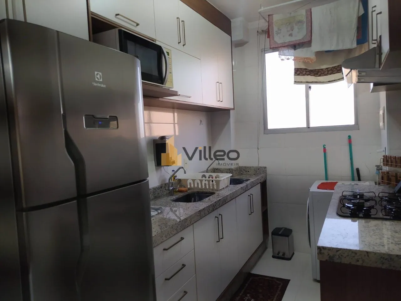 Imagem Descubra um novo padrão de viver no coração do Jardim São Carlos. Este refinado apartamento à v...