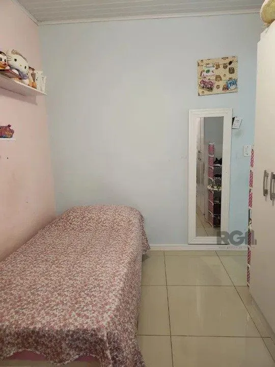 Imagem Casa com 4 quartos, 1 suíte, 7 vagas - 97,32m² no bairro Jardim Carvalho, Poa/RS