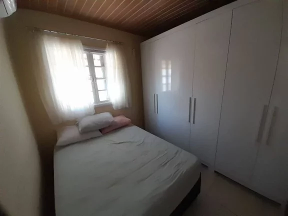Imagem Casa com 2 dormitórios à venda, 49 m² por R$ 460.000 - Ocian - Praia Grande/SP