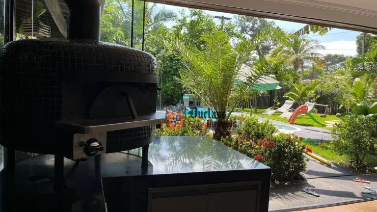 Foto do imóvel Casa com 5 suítes à venda, 200 m² por R$ 3.400.000 - Condomínio Costa do Sol - Bertioga/SP