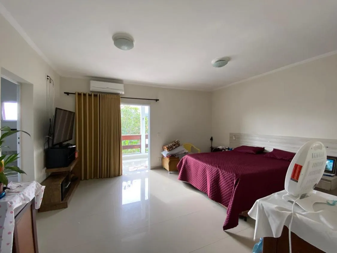 Imagem CASA DE ALTO PADRÃO COM 04 DORMITÓRIOS, PISCINA AQUECIDA E ACEITA FINANCIAMENTO BANCÁRIO LADO PRAIA EM ITANHAÉM