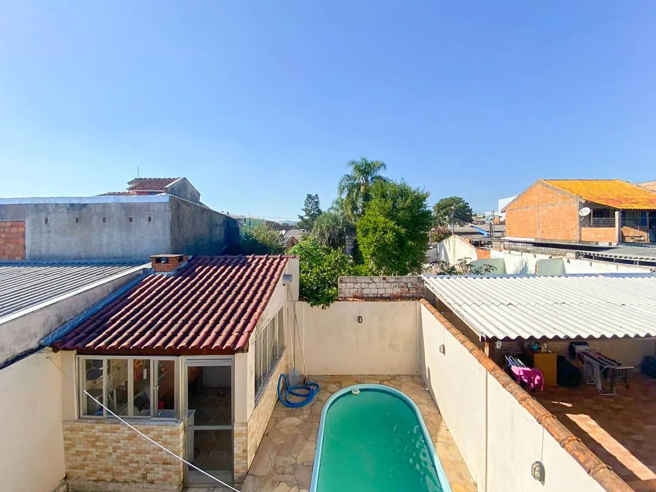 Imagem Casa / 3 Quartos / 1 Suíte / Piscina / Cgurrasqueira / 4 Vagas / Porto Verde / Jardim Algarve / Alvorada / RS