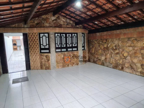 Foto do imóvel Casa com 2 dormitórios à venda por R$ 530.000,00 - Tupi - Praia Grande/SP
