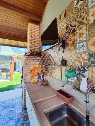 Imagem Casa Espetacular com 4 suítes Ninho Verde 1 - Encante-se com seu novo lar