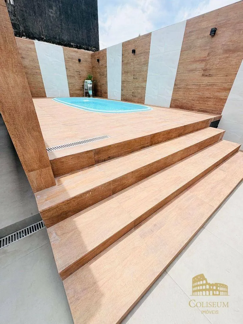 Imagem Casa com 3 dormitórios à venda por R$ 770.000,00 - Jardim Anhangüera - Praia Grande/SP
