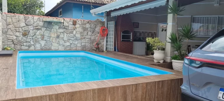 Foto do imóvel Linda casa à venda com piscina, 3 quartos, 1 suíte, 3 vagas em Peruíbe, SP