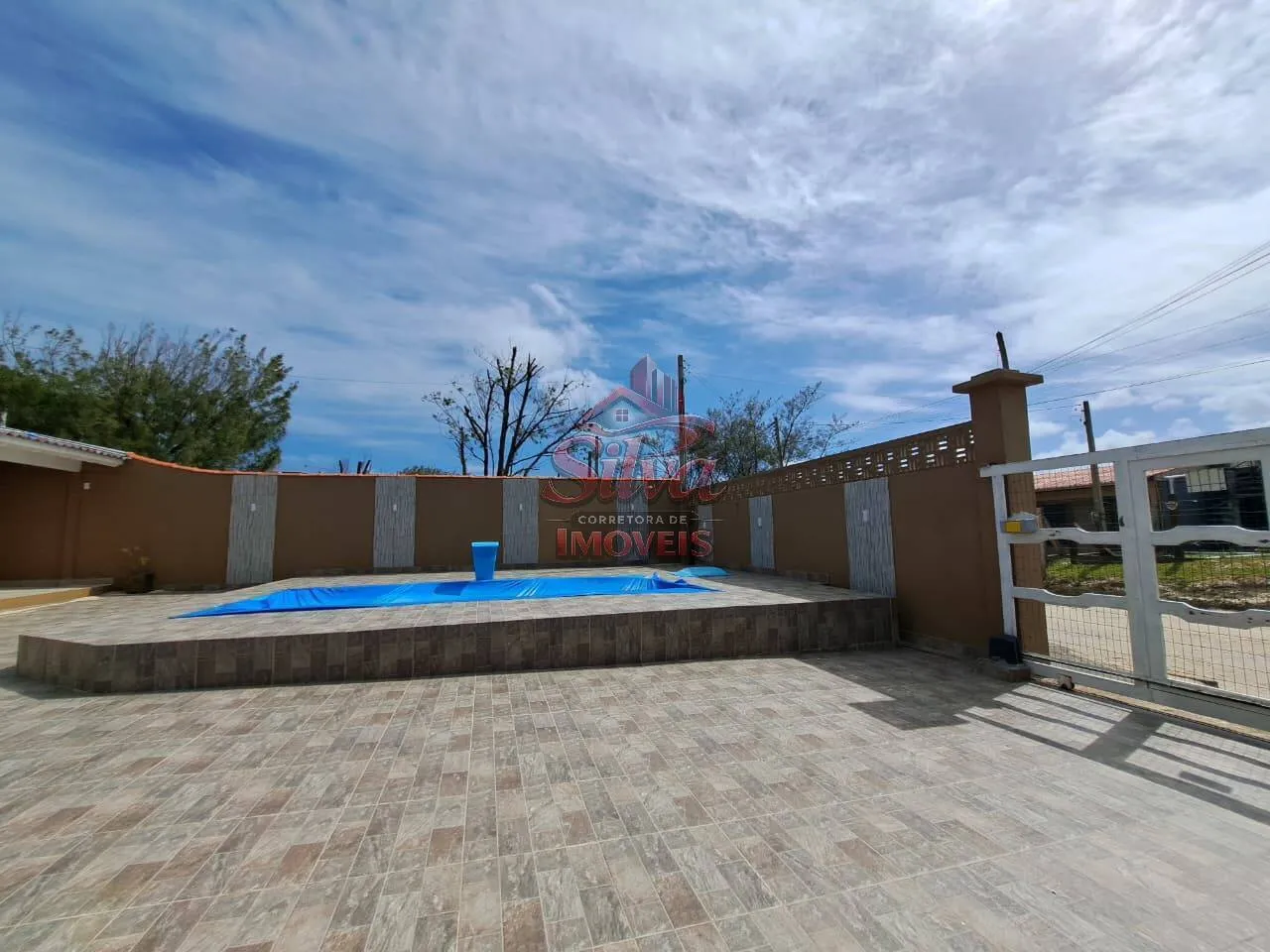 Imagem C127 |Casa 4 dormitórios com piscina aquecida a 30m do mar