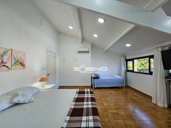 Imagem Casa à venda com 4 dormitórios 2 suítes 275m² de área útil, na Riviera de São Lourenço - Bertioga SP