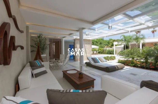 Imagem Imponente mansão de luxo na Barra da Tijúca: 5 quartos, 4 suítes, 3 salas, 7 banheiros, 2 vagas de garagem, 920m² de área. Venda!