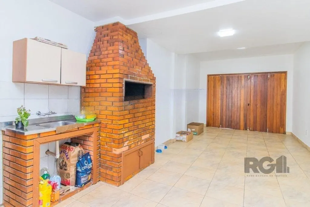 Imagem Casa de 4 dormitórios no bairro Cavalhada