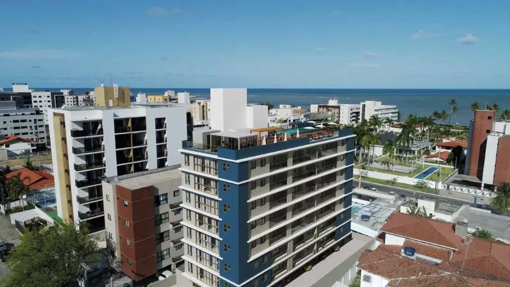 Imagem Apartamento moderno a 80m da praia no Jardim Oceania, com 2 suítes, varanda gourmet e lazer completo. Ideal para morar ou investir.
