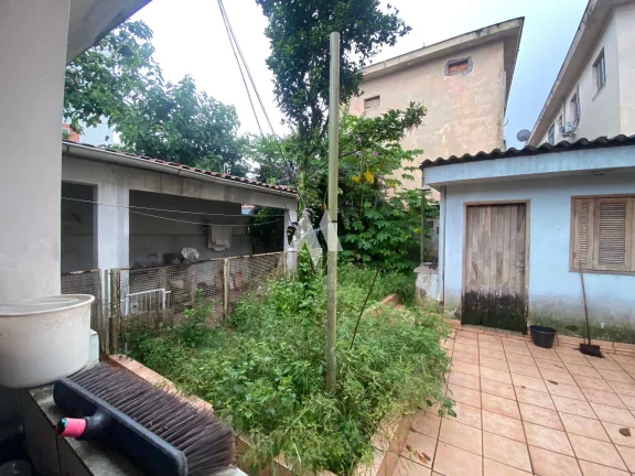 Imagem Casa à venda com 3 dormitórios e edícula no bairro Aparecida de Santos/SP