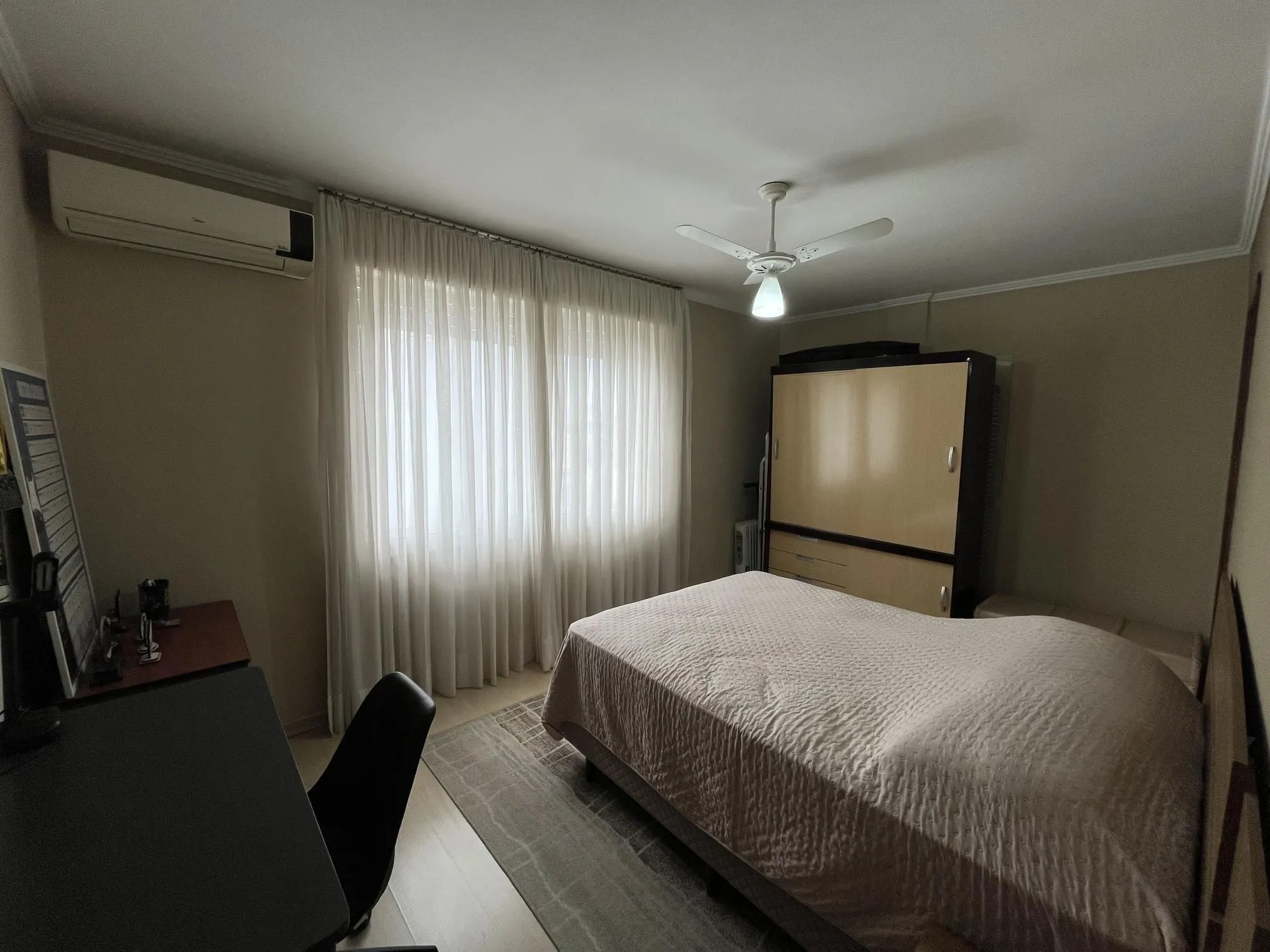 Imagem Apartamento de dois quartos com suíte no bairro Menino Deus em Porto Alegre