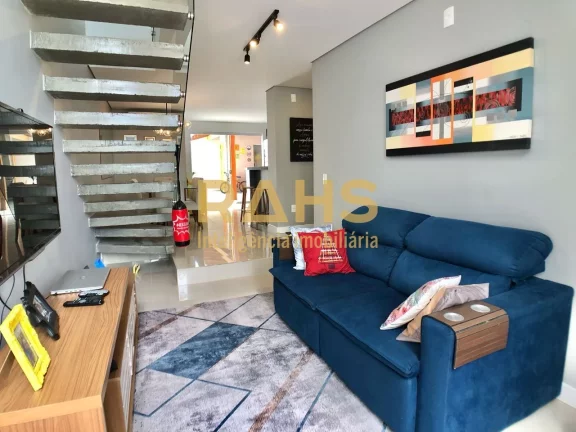 Imagem Sobrado Geminado com 115 m² de área construída com 1 suíte e 2 quartos, 2 vagas de garagem a ven...