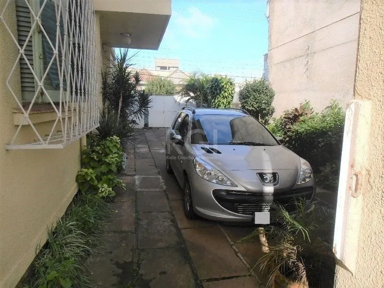 Imagem Casa para Venda - 159m², 3 dormitórios, 3 vagas - Menino Deus