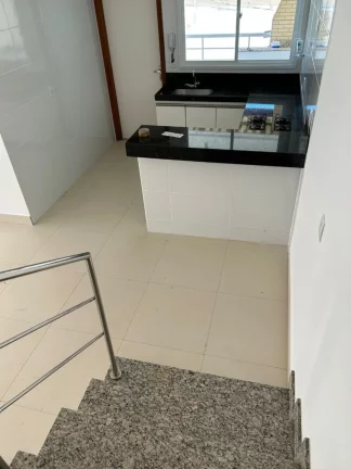 Imagem Belíssima casa duplex composta de 3 quartos sendo uma suíte área gourmet com churrasqueira bairro Ipiranga Guarapari