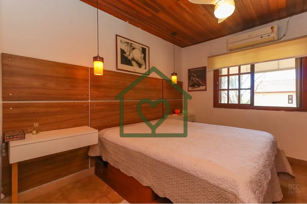 Imagem Casa à venda no bairro Hípica com 165 m2 de área privativa em terreno de 492 m2. O imóvel conta ...