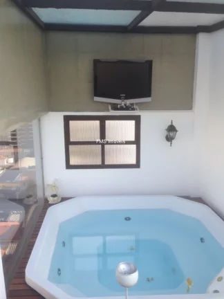 Imagem Luxuoso apartamento de 5 quartos com 5 suítes no Campo Belo, São Paulo-SP: 3 salas, 5 banheiros, 4 vagas e 447m² de área.