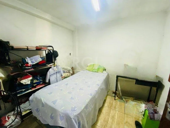 Imagem CASA BAIRRO CAMAQUÃ COM 4 DORMITORIOS