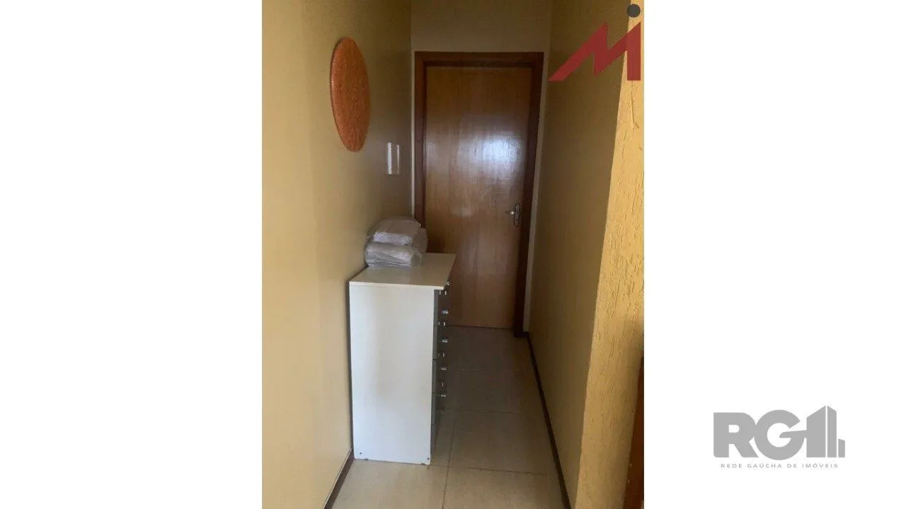 Imagem Sobrado em Trmandai com 2 suirtes, 2 banheiros, 1 vaga, churrasqueira e varanda.