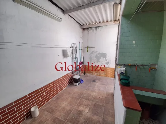 Imagem Casa com 3 dormitórios e 2 vagas à venda no Macuco em Santos R$ 900.000,00