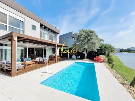 Imagem Casa condomínio com 05 suites e piscina aquecida