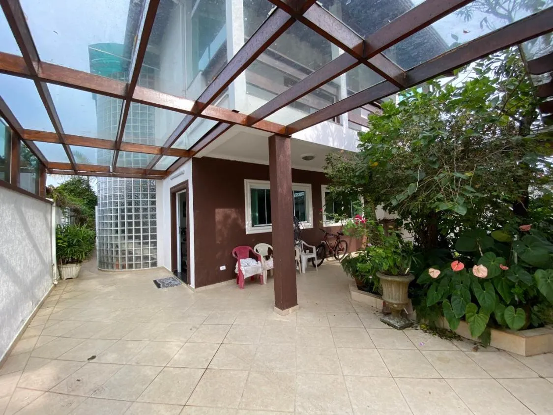 Foto do imóvel CASA DE ALTO PADRÃO COM 04 DORMITÓRIOS, PISCINA AQUECIDA E ACEITA FINANCIAMENTO BANCÁRIO LADO PRAIA EM ITANHAÉM
