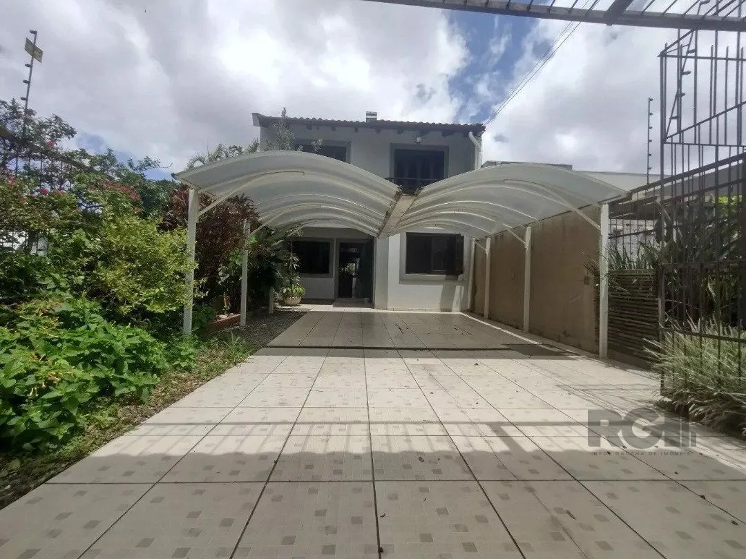 Imagem Casa 4 dormitórios, Bairro Cavalhada.