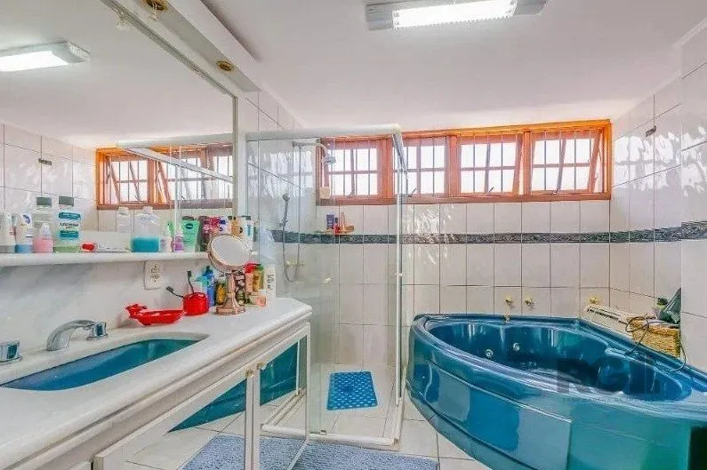 Imagem Casa 221m² - 3 dormitórios, 1 suíte, 4 vagas de garagem no bairro Vila Assunção