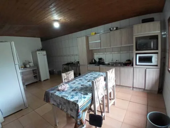 Imagem Sítio com Casa em condomínio Fechado, Próximo da portaria, junto a RS040