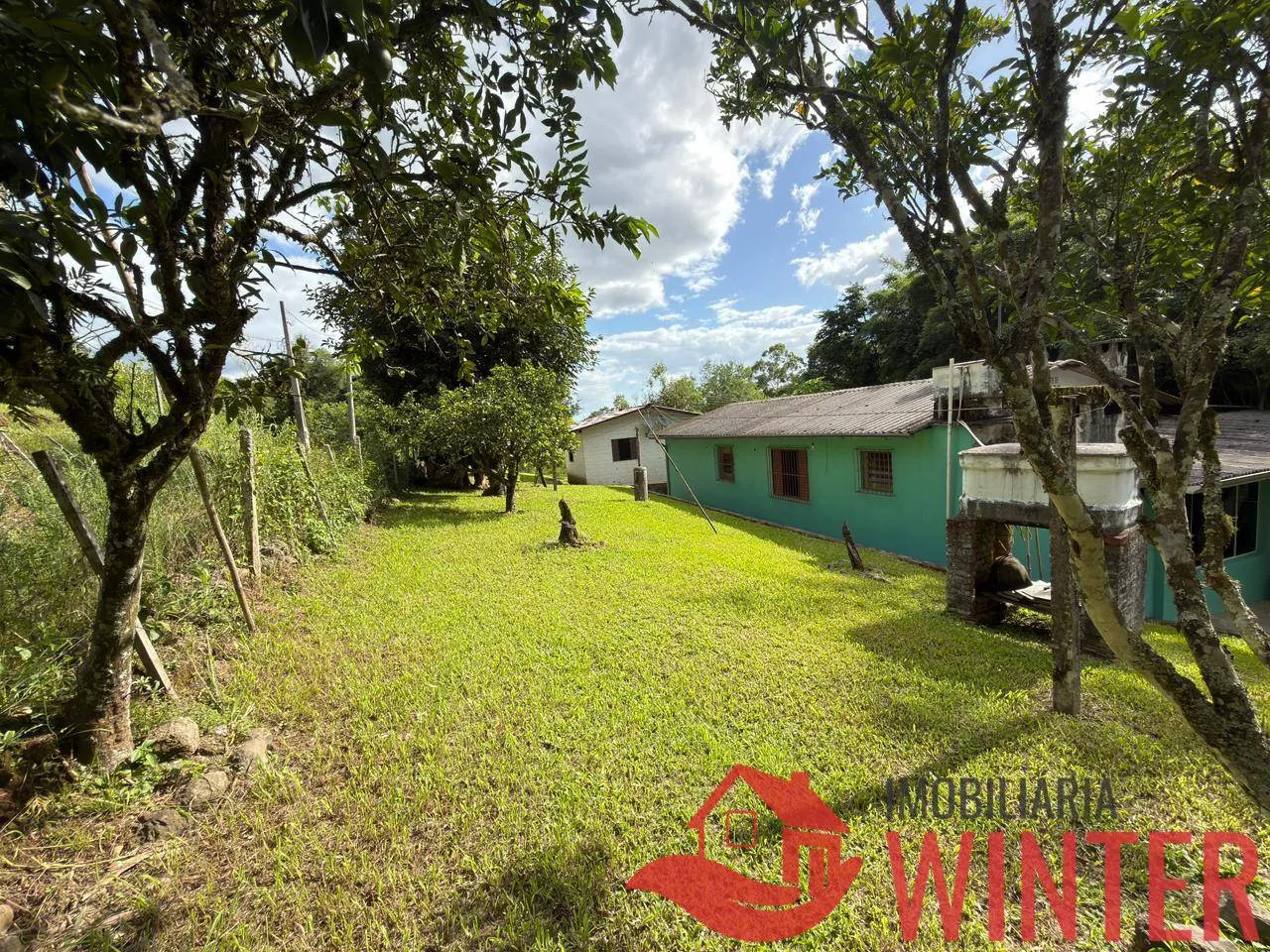 Imagem Imóvel com 2 casas e um galpão