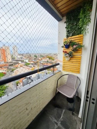 Imagem Apartamento com 49,6 m², composto por 2 dormitórios, sala para dois ambientes, varanda, cozinha, l...