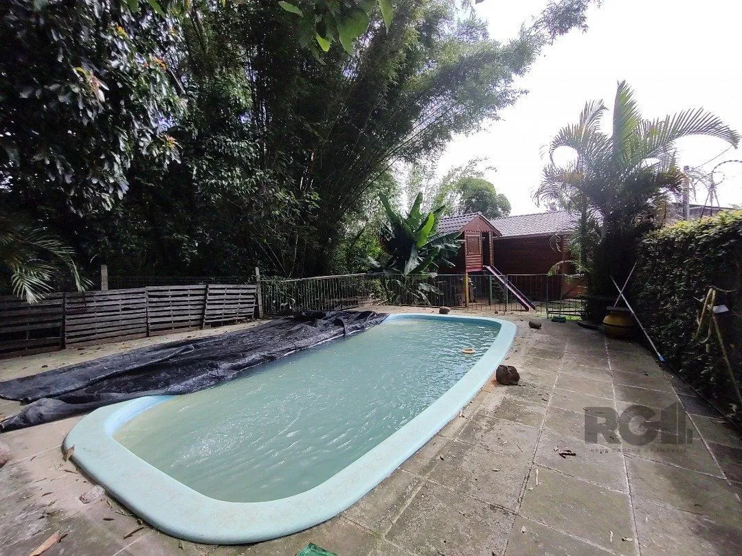 Imagem Casa térrea, 2 quartos, edícula com 2 quartos, pático, piscina - Bairro Cavalhado