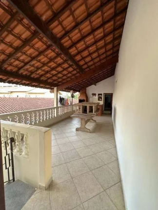 Imagem Sobrado com 3 dormitórios à venda, 147 m² por R$ 650.000 - Tupi - Praia Grande/SP