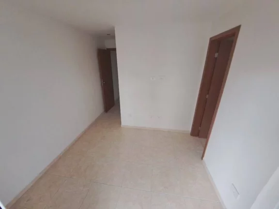 Imagem Apartamento com 2 dormitórios à venda, 56 m² por R$ 320.000 - Caiçara - Praia Grande/SP