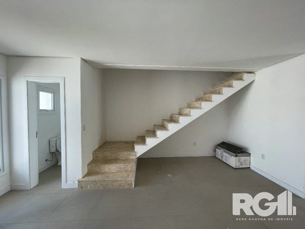Imagem Casa em bairro planejado de Canoas com excelência em beleza e qualidade.