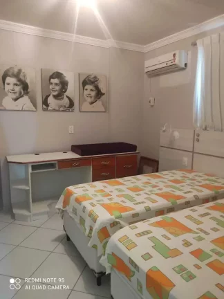 Imagem Apartamento com 2 dormitórios sendo 1 suíte e 1 vaga de garagem em Itapema/SC