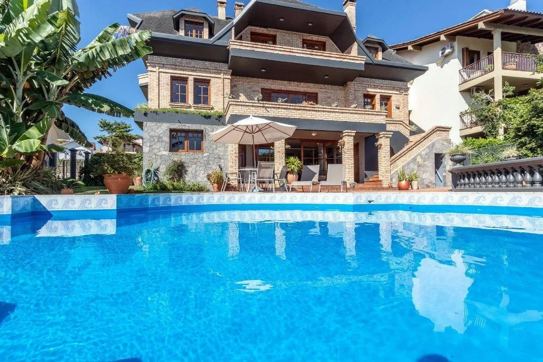 Imagem Casa Condominio para Venda - 559m², 4 dormitórios, sendo 3 suites, 3 vagas - Cavalhada