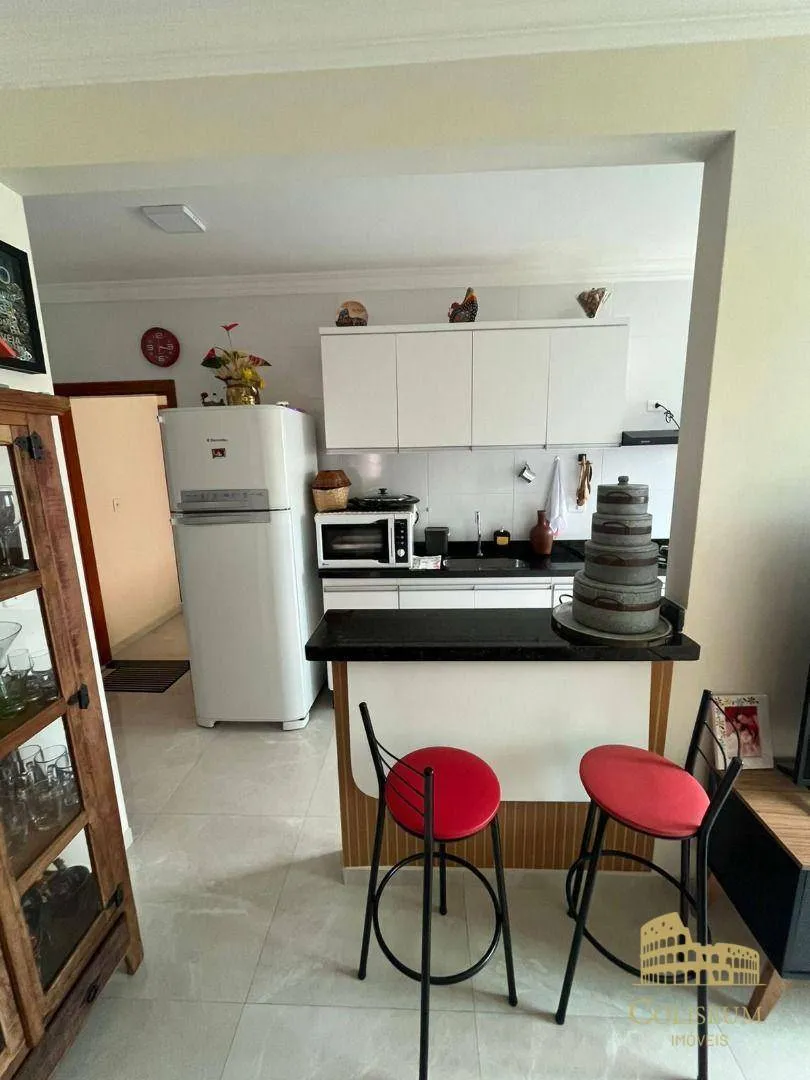 Imagem Casa com 2 dormitórios à venda, 50 m² por R$ 320.000,00 - Vila Caiçara - Praia Grande/SP