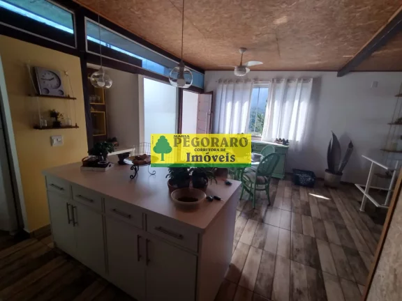 Imagem Casa à venda em Caraguatatuba-SP: 3 quartos, suíte, sala com vista para o mar e deck com hidro!