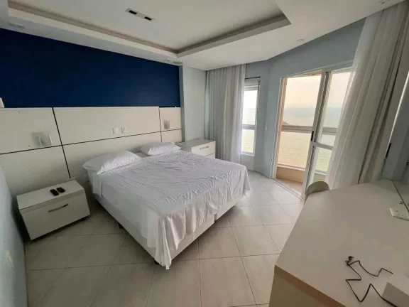 Imagem Apartamento frente mar com 3 suítes e 4 vagas de garagem em Balneário Camboriú